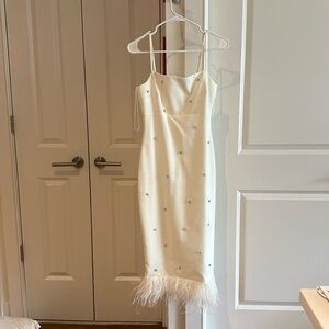 Likely Dress Size 2. Perfect for cocktail and welcome dinner